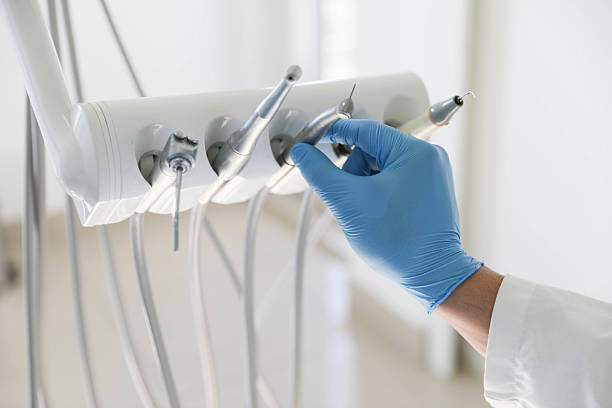 Professional Tooth Extraction technician working in Glen Raven, NC